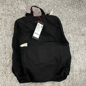 Tumi Just In Case Black Backpack with Storage Bag